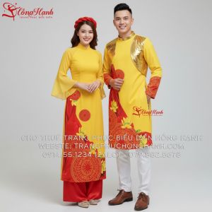 Áo dài Nam Nữ màu vàng họa tiết trống đồng & hoa mai